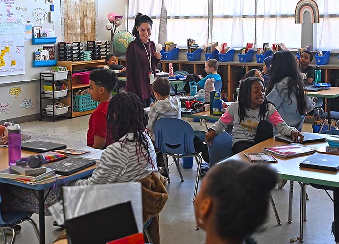 Teacher and students in a classroom