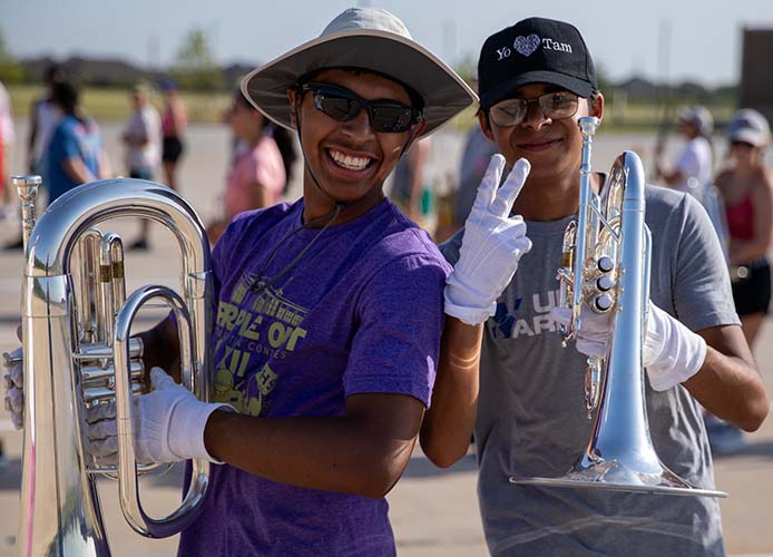Students posing with instruments