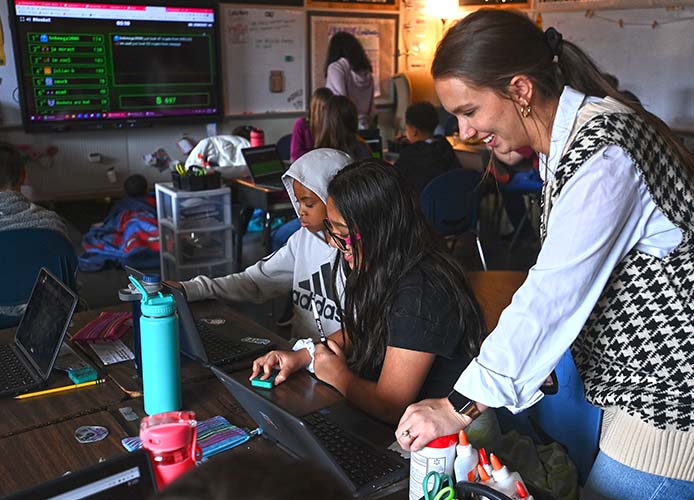 Students and teacher working
