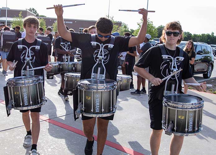 students playing drums