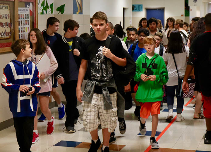 students in a hall way