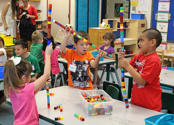 students playing with STEM 