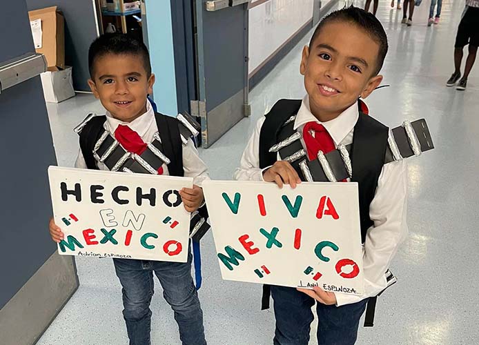 students holding a poster