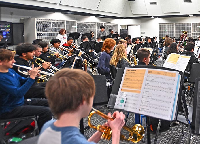 Students playing instruments