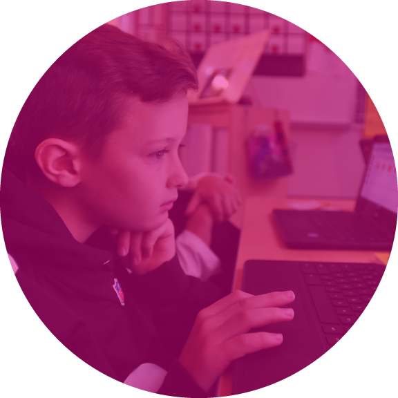 student looking at a laptop