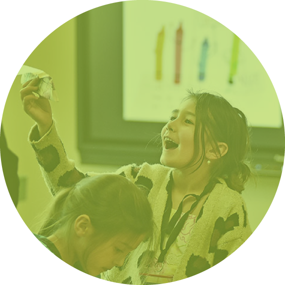 Student holding a piece of paper